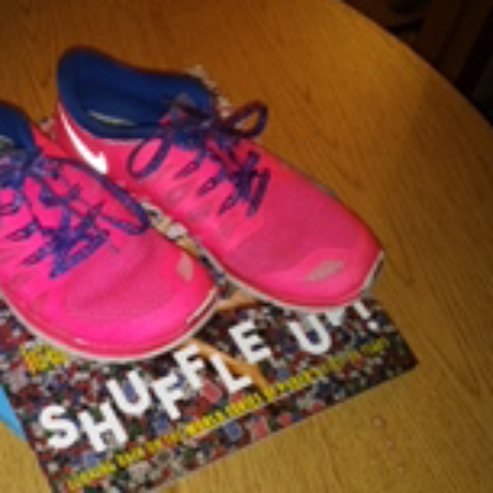 Pink nike running shoes
